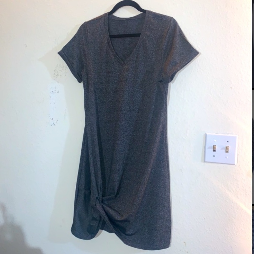 T-shirt dress with tie bottom. Size small runs big